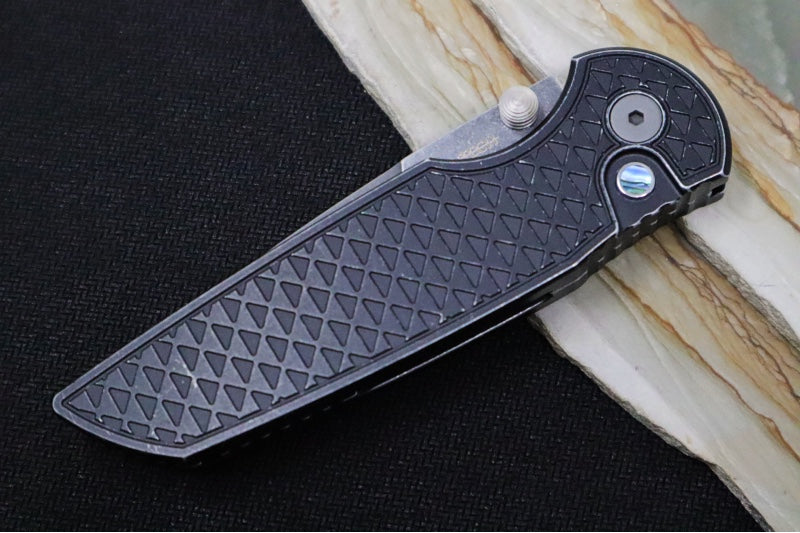 Pro Tech TR-3 Integrity Bladeshow West Exclusive - Drop Point with Double Thumb Studs / Acid Washed Finish / CPM-S35VN Steel / Relic Textured Battleworn Black Anodized Titanium Handle / Abalone Button