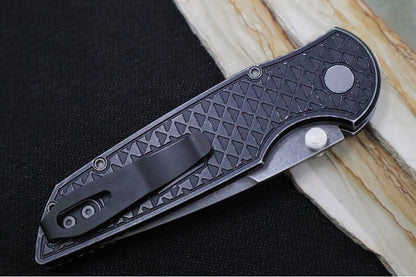 Pro Tech TR-3 Integrity Bladeshow West Exclusive - Drop Point with Double Thumb Studs / Acid Washed Finish / CPM-S35VN Steel / Relic Textured Battleworn Black Anodized Titanium Handle / Abalone Button