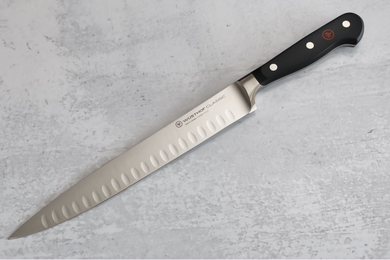 Wusthof Classic - 9" Carving Knife w/ Hollow Edge- Fully forged German stainless steel (X50 CrMoV 15) - Made in Solingen, Germany