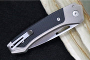 Lionsteel Twain Solid Button Lock Folder - Drop Point Blade / CPM-Magnacut Steel / Gray Titanium Handles with Integral Black G-10 Inlay TWGYGBK - Northwest Knives