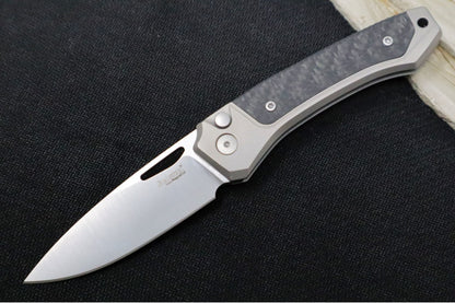 Lionsteel Twain Solid Button Lock Folder - Drop Point Blade / CPM-Magnacut Steel / Gray Titanium Handles with Integral Carbon Fiber Inlay TWGYCF