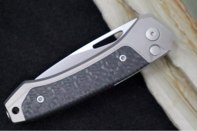 Lionsteel Twain Solid Button Lock Folder - Drop Point Blade / CPM-Magnacut Steel / Gray Titanium Handles with Integral Carbon Fiber Inlay TWGYCF