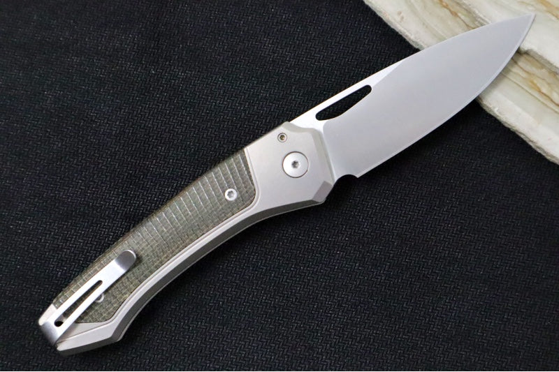 Lionsteel Twain Solid Button Lock Folder - Drop Point Blade / CPM-Magnacut Steel / Gray Titanium Handles with Integral Green Micarta Inlay TWGYCVG