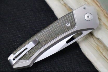 Lionsteel Twain Solid Button Lock Folder - Drop Point Blade / CPM-Magnacut Steel / Gray Titanium Handles with Integral Green Micarta Inlay TWGYCVG