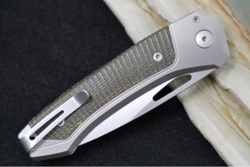 Lionsteel Twain Solid Button Lock Folder - Drop Point Blade / CPM-Magnacut Steel / Gray Titanium Handles with Integral Green Micarta Inlay TWGYCVG - Northwest Knives