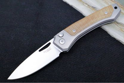 Lionsteel Twain Solid Button Lock Folder - Drop Point Blade / CPM-Magnacut Steel / Gray Titanium Handles with Integral Natural Micarta Inlay TWGYCVN