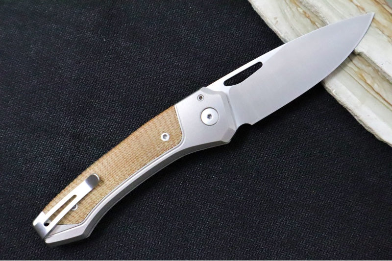 Lionsteel Twain Solid Button Lock Folder - Drop Point Blade / CPM-Magnacut Steel / Gray Titanium Handles with Integral Natural Micarta Inlay TWGYCVN