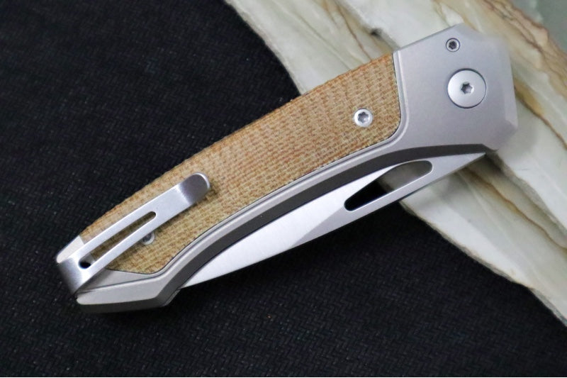 Lionsteel Twain Solid Button Lock Folder - Drop Point Blade / CPM-Magnacut Steel / Gray Titanium Handles with Integral Natural Micarta Inlay TWGYCVN - Northwest Knives