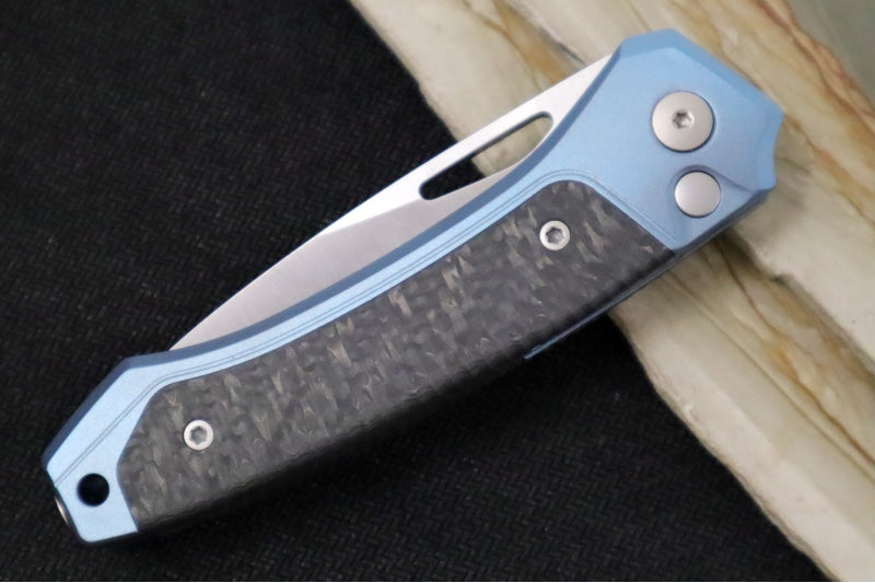 Lionsteel Twain Solid Button Lock Folder - Drop Point Blade / CPM-Magnacut Steel / Blue Titanium Handles with Integral Carbon Fiber Inlay TWBLCF