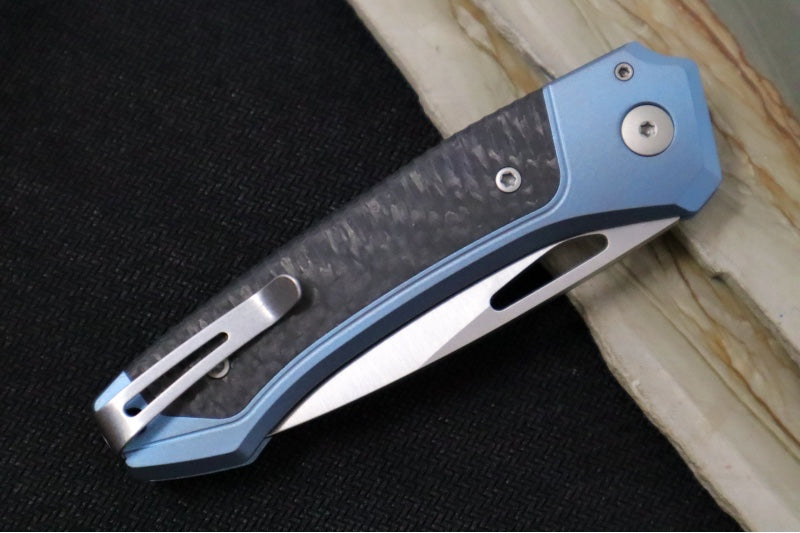 Lionsteel Twain Solid Button Lock Folder - Drop Point Blade / CPM-Magnacut Steel / Blue Titanium Handles with Integral Carbon Fiber Inlay TWBLCF