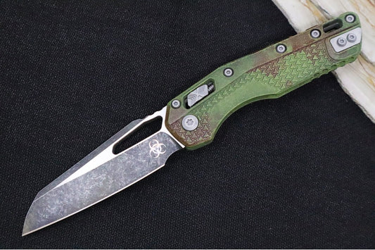 Microtech MSI Outbreak Manual Folder - Reverse Tanto / Blackwashed Finished Blade / Green Polymer w/ Trim-Grip Handle & Red Blood Splatter