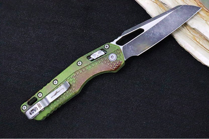 Microtech MSI Outbreak Manual Folder - Reverse Tanto / Blackwashed Finished Blade / Green Polymer w/ Trim-Grip Handle & Red Blood Splatter