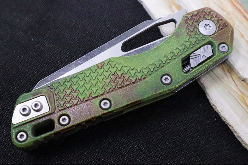 Microtech MSI Outbreak Manual Folder - Reverse Tanto / Blackwashed Finished Blade / Green Polymer w/ Trim-Grip Handle & Red Blood Splatter