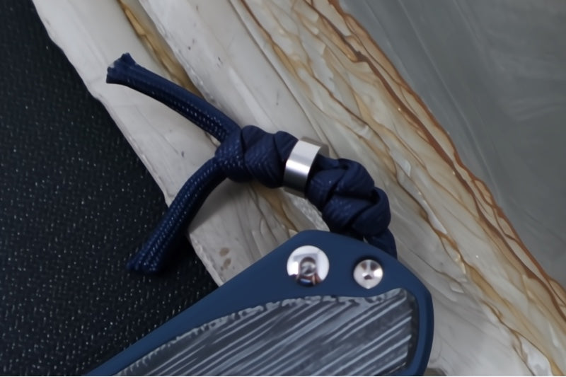 Chris Reeve Knives Large Sebenza 31 NWK Exclusive - Drop Point Blade / CPM-Magnacut Steel / Navy Blue Cerakote Handle with Black Micarta / Midnight Lanyard L31-1736