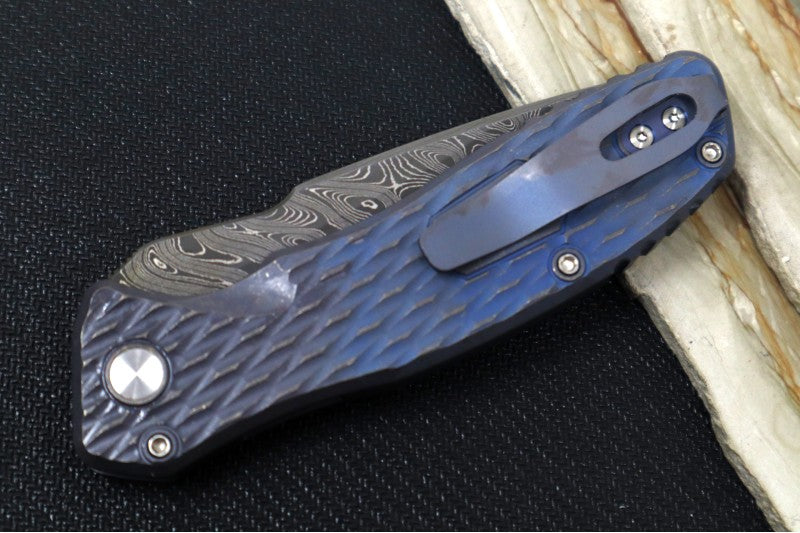 Pro Tech Pallas Auto Blade Show West Exclusive - Distress Blue & Bronzed Anodized Titanium Lattice Textured Handle / Chad Nichols Boomerang Damascus Steel / Black Lip Pearl Push Button / Blue Ti Wide Deep Carry Clip - Northwest Knives