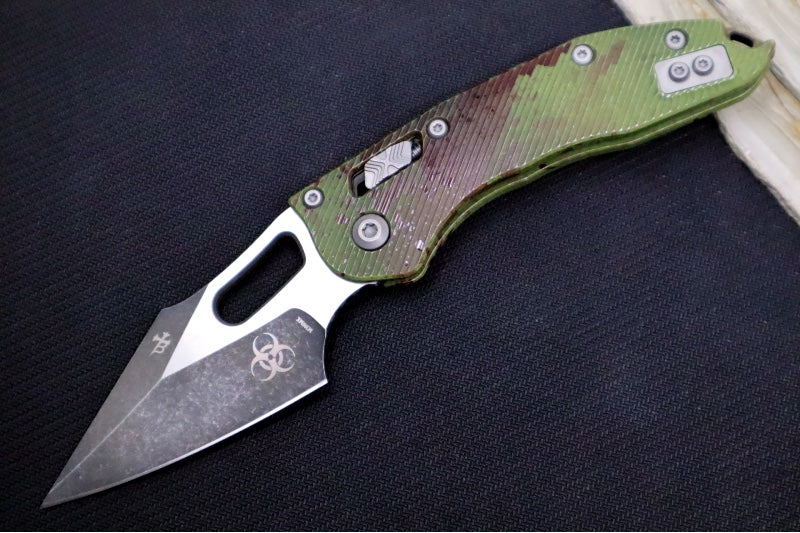 Microtech Stitch RAM-Lock Manual Outbreak - Spear Point Blade / Darkwash Outbreak Finish / Outbreak Green Anodized Aluminum with Blood Splatter 169RL-1FLOBS - Northwest Knives