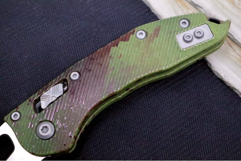 Microtech Stitch RAM-Lock Manual Outbreak - Spear Point Blade / Darkwash Outbreak Finish / Outbreak Green Anodized Aluminum with Blood Splatter 169RL-1FLOBS - Northwest Knives