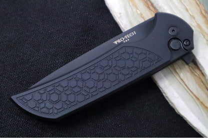 Pro Tech Mordax - Drop Point / Black DLC Finish / CPM-Magnacut Steel / Black Aluminum Handle with a "Gridlock" Pattern MX106-Gridlock