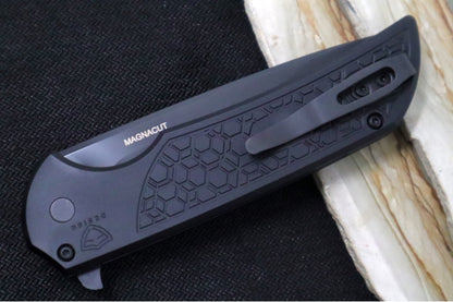 Pro Tech Mordax - Drop Point / Black DLC Finish / CPM-Magnacut Steel / Black Aluminum Handle with a "Gridlock" Pattern MX106-Gridlock