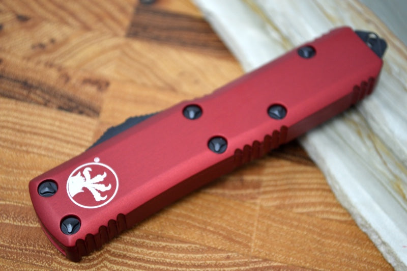 Microtech UTX-85 OTF - Single Edge with Partial Serrate / Black Blade / Red Body - 231-2RD