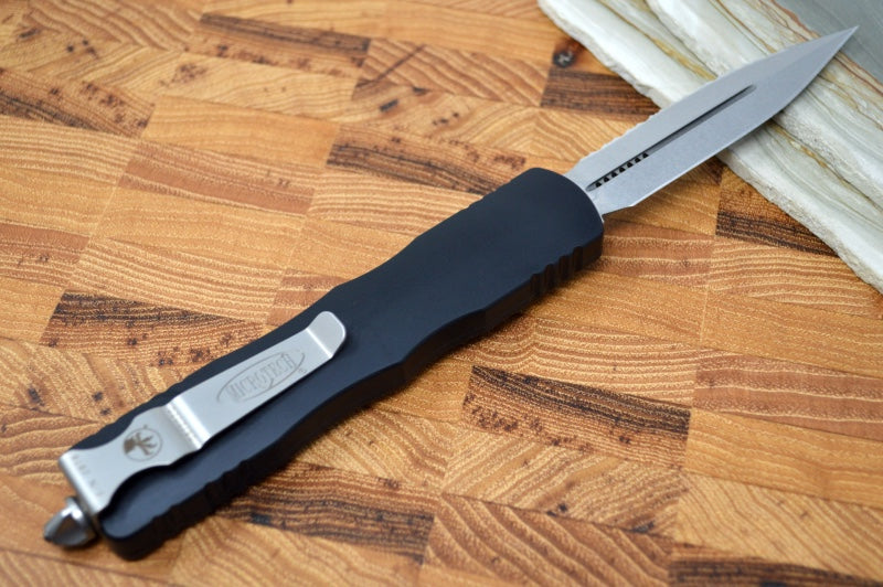 Microtech Dirac Delta OTF - Black Finish / Full Serrated Dagger Blade / Black Aluminum Handle 227-12