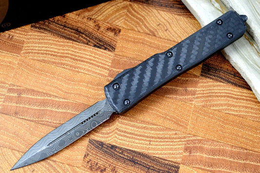 Microtech UTX-70 OTF Signature Series - Damascus Dagger Blade / Carbon Fiber Top / Ringed Hardware 147-16CFS