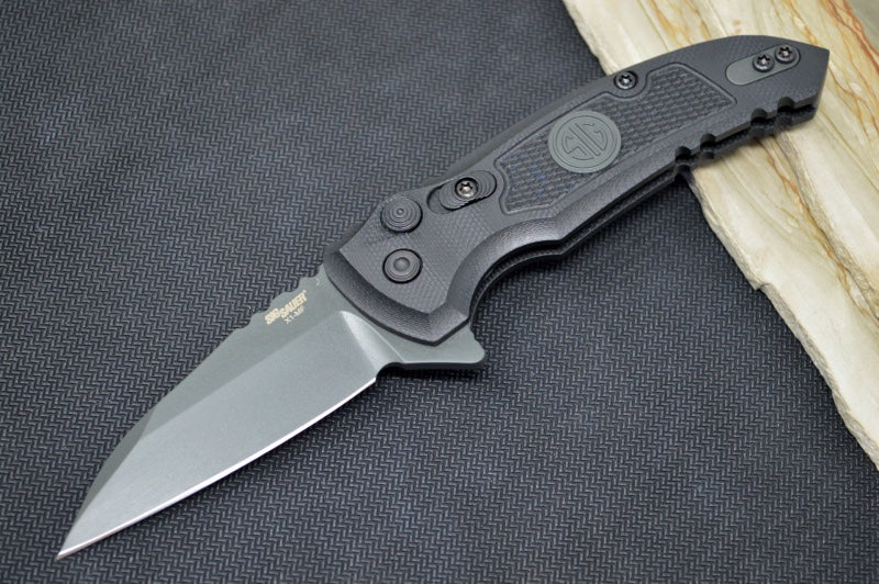 Hogue Knives X1 Microflip Sig Sauer Edition- Solid Black G10 Handle / 154CM Blade / Grey Wharncliffe Blade / SIG Medallion 16162