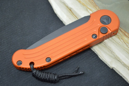 Microtech L.U.D.T - Black Blade with Partial Serrate / Orange Anodized Aluminum Handle 135-2OR