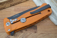 Lionsteel SR-22 Orange Aluminum Integral Flipper - Black Blade - SR22A-OB - Northwest Knives