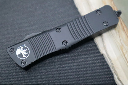 Microtech Troodon OTF Tactical - Double Edge / Black Full Serrated Blade / Black Anodized Aluminum Handle 138-3T