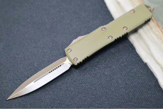Microtech UTX-85 OTF Signature Series - Dagger Blade / Bronzed Apocalyptic Finish / OD Green & Black Aluminum Body - 232-13APGTODS