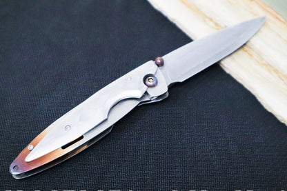 MCUSTA Shinra Kasumi Japanese Folding Knife - Damascus Blade / Drop Point / Damascus Handle with Gentle Flame Anodization MC-0031D
