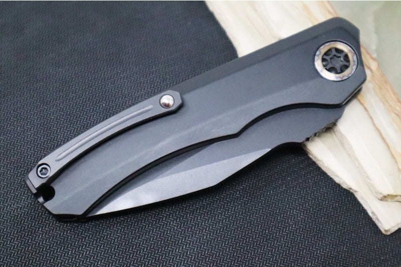 Heretic Knives Wraith Auto - Black DLC Drop Point / Aluminum Handle & Marbled Carbon Fiber Bolster H000-4A-T