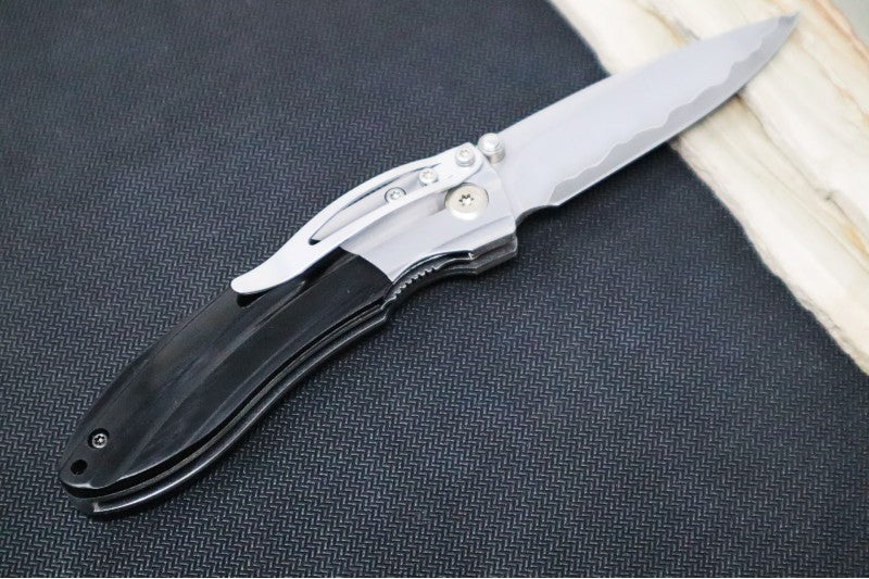 MCUSTA Shinra Mixture Ripple Japanese Folding Knife - 3 Layers SPG2 Powdered Steel (San Mai) Blade / Drop Point / Black Pakka Wood Handle MC-0142G