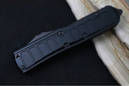 Microtech UTX-85 OTF Signature Series II Tactical - Single Edge with Partial Serrate / Black Finish / Black Hardware & Clip / Textured Black Body  - 231II-2TS
