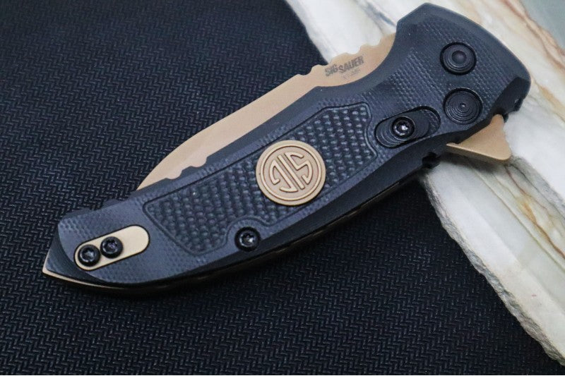 Hogue Knives X1 Microflip Sig Sauer Edition- Solid Black G10 Handle / CPM-154 Steel / Bronzed Wharncliffe Blade / SIG Medallion 16160