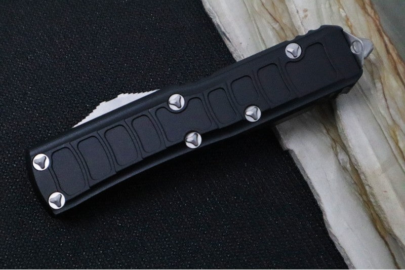 Microtech UTX-85 OTF Signature Series II - Double Edge with Full Serrate / Stonewashed Finish / Stonewashed Hardware & Clip / Textured Black Body  - 232II-12S