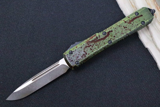 Microtech Ultratech Signature Series Outbreak OTF - Single Edge Style / Patina Finished Blade / Green Handle & Blood Splatter / Deep Engraved Biohazard Symbol 121-1OBDS