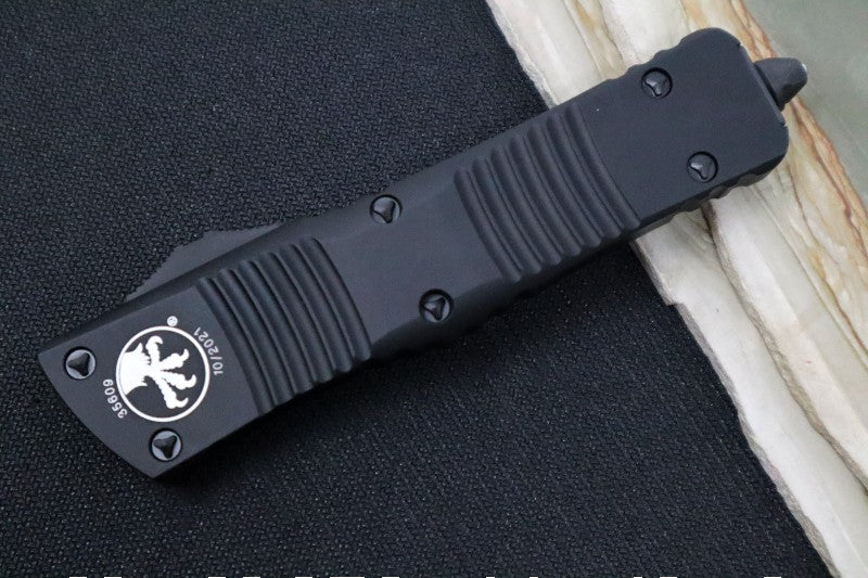 Microtech Combat Troodon OTF Tactical - Black Blade / Fully Serrated Tanto Style / Black Handle - 144-3T
