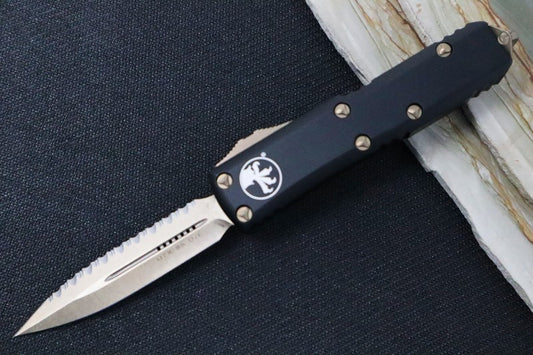 Microtech UTX-85 OTF - Double Edge with Full Serrate / Bronzed Blade / Black Body - 232-15