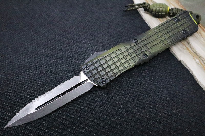 Microtech Combat Troodon OTF Signature Series - Double Reverse Full Serrated Blade / Dagger Style / Frag Grenade Green Aluminum Handle 142-DR12APFOGG