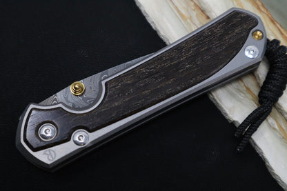 Chris Reeve Knives Large Sebenza 31 Left Handed - Drop Point Blade / Bog Oak Inlay / Chad Nichols Boomerang Damascus L31-1103 (A1)