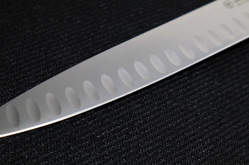 Wusthof Classic - 9" Carving Knife w/ Hollow Edge- Fully forged German stainless steel (X50 CrMoV 15) - Made in Solingen, Germany