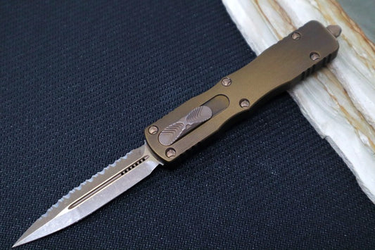 Microtech Dirac Signature Series OTF - Double Edge with a Full Serrate / Bronzed Apocalyptic Blade & Hardware / Antique Bronzed Handle 225-15APABS