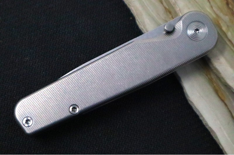 Tactile Turn Rockwall Thumbstud - Titanium Handle / Magnacut Steel / Drop Point Blade