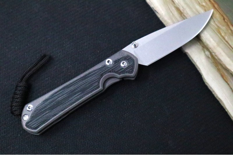 Chris Reeve Knives Small Sebenza 31 LEFT HAND - Drop Point / Black Canvas Micarta Inlay