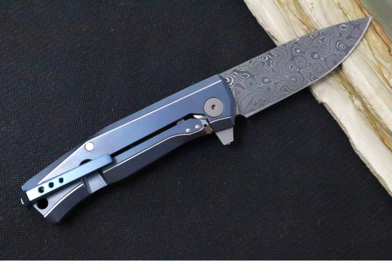 Lionsteel Myto Flipper - Drop Point Blade / Chad Nichols Raindrop Damascus / Blue Anodized Titanium Handle MT01DBL