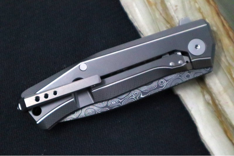 Lionsteel Myto Flipper - Drop Point Blade / Chad Nichols Raindrop Damascus / Grey Anodized Titanium Handle MT01DGY