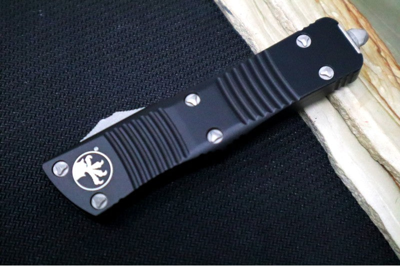 Microtech Troodon OTF - Tanto Style with Partial Serrate / Stonewash Blade / Black Handle - 140-11AP