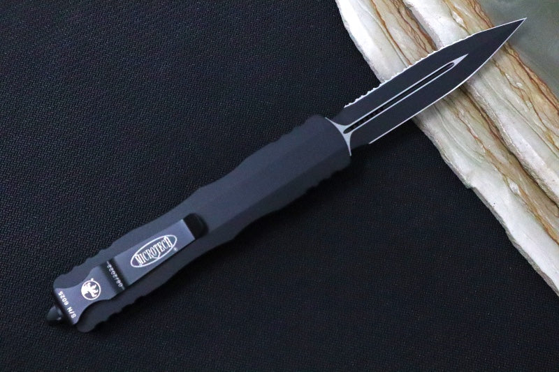 Microtech Dirac Delta Tactical OTF - Black Finish / Fully Serrated Dagger Blade / Black Aluminum Handle 227-3T